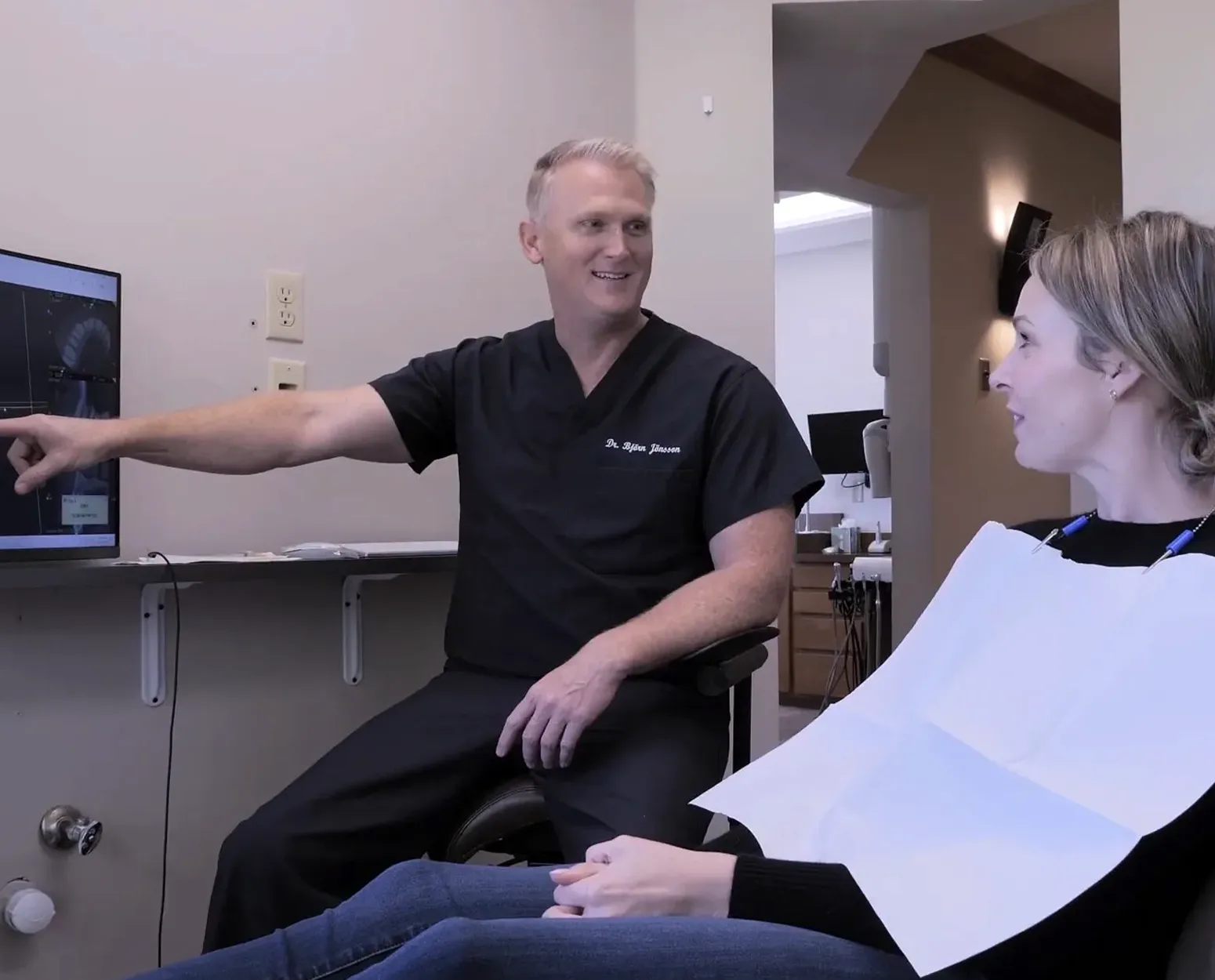Endodontist reviewing CBCT scan for resorption