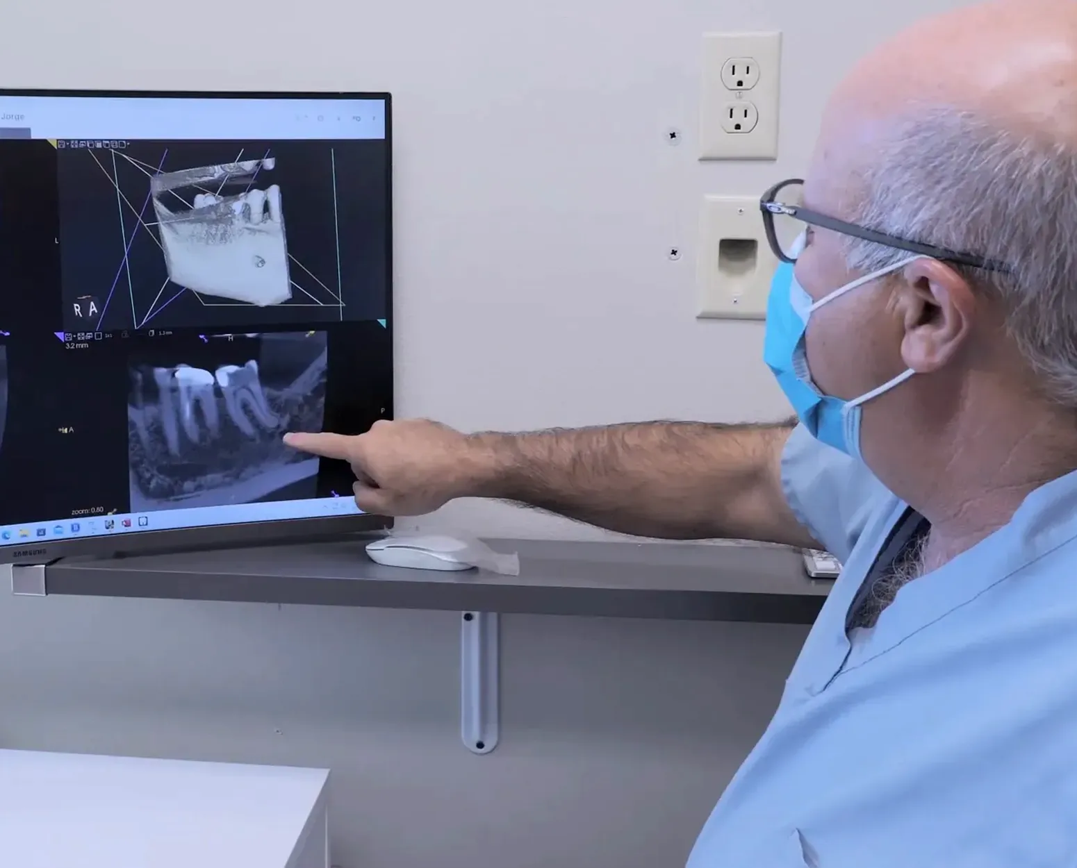 Endodontist reviewing resorption case